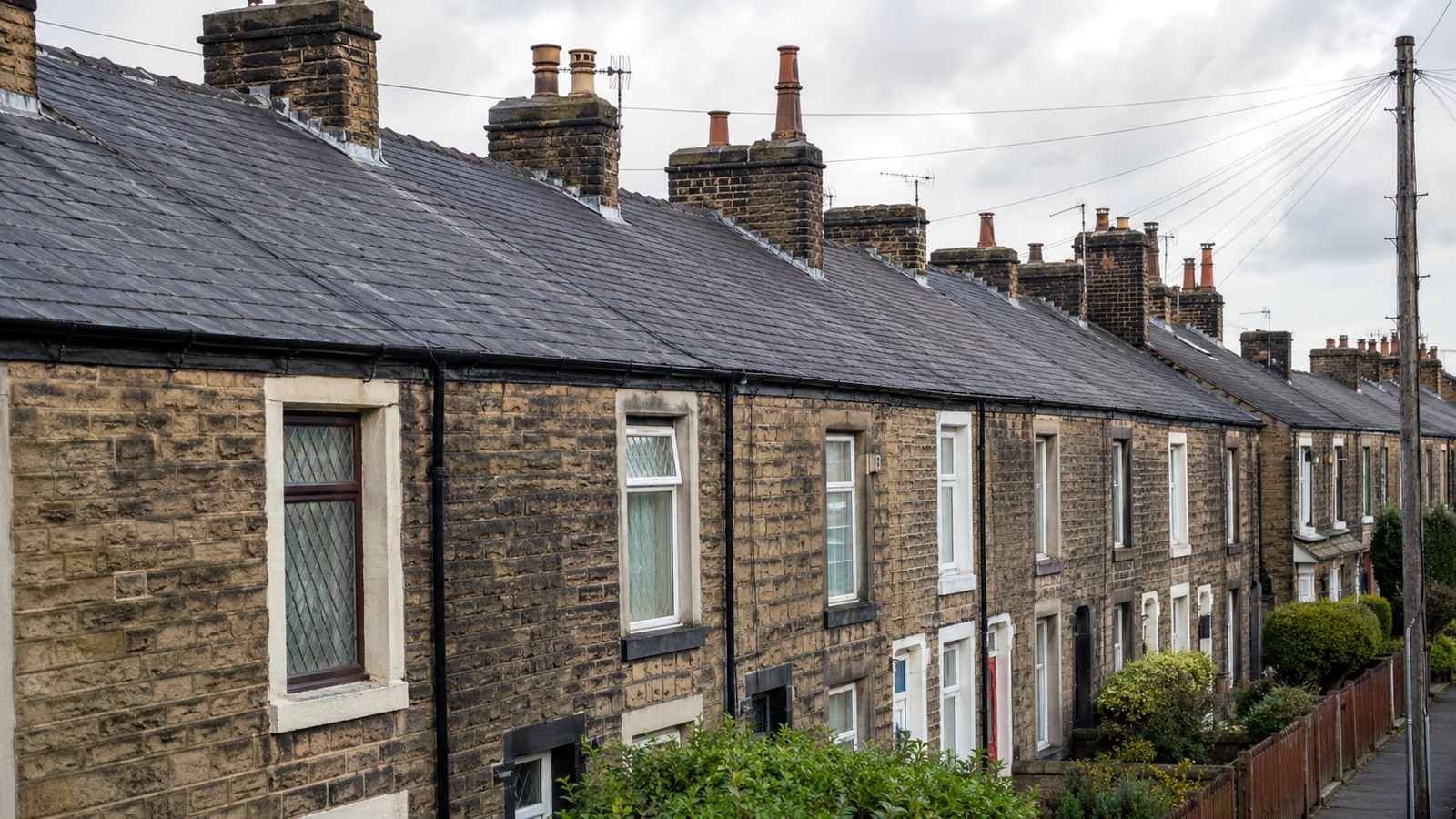 Older stone terraced housing with slate roofs